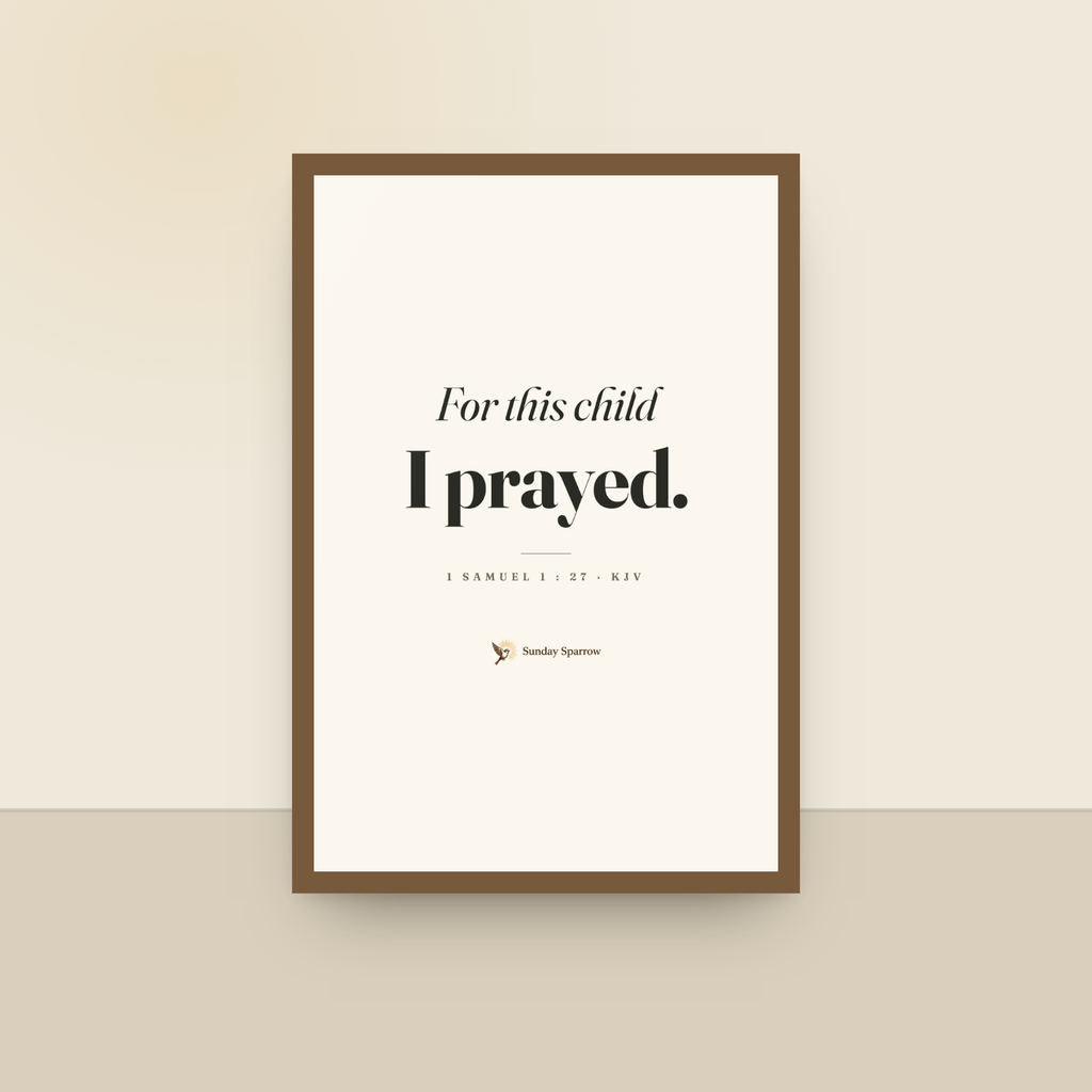For This Child I Prayed (1 Samuel 1:27) — King James scripture art print in a oak finish wood frame, hanging on a wall