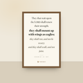 Wings As Eagles (Isaiah 40:31) — King James scripture art print in a oak finish wood frame, hanging on a wall