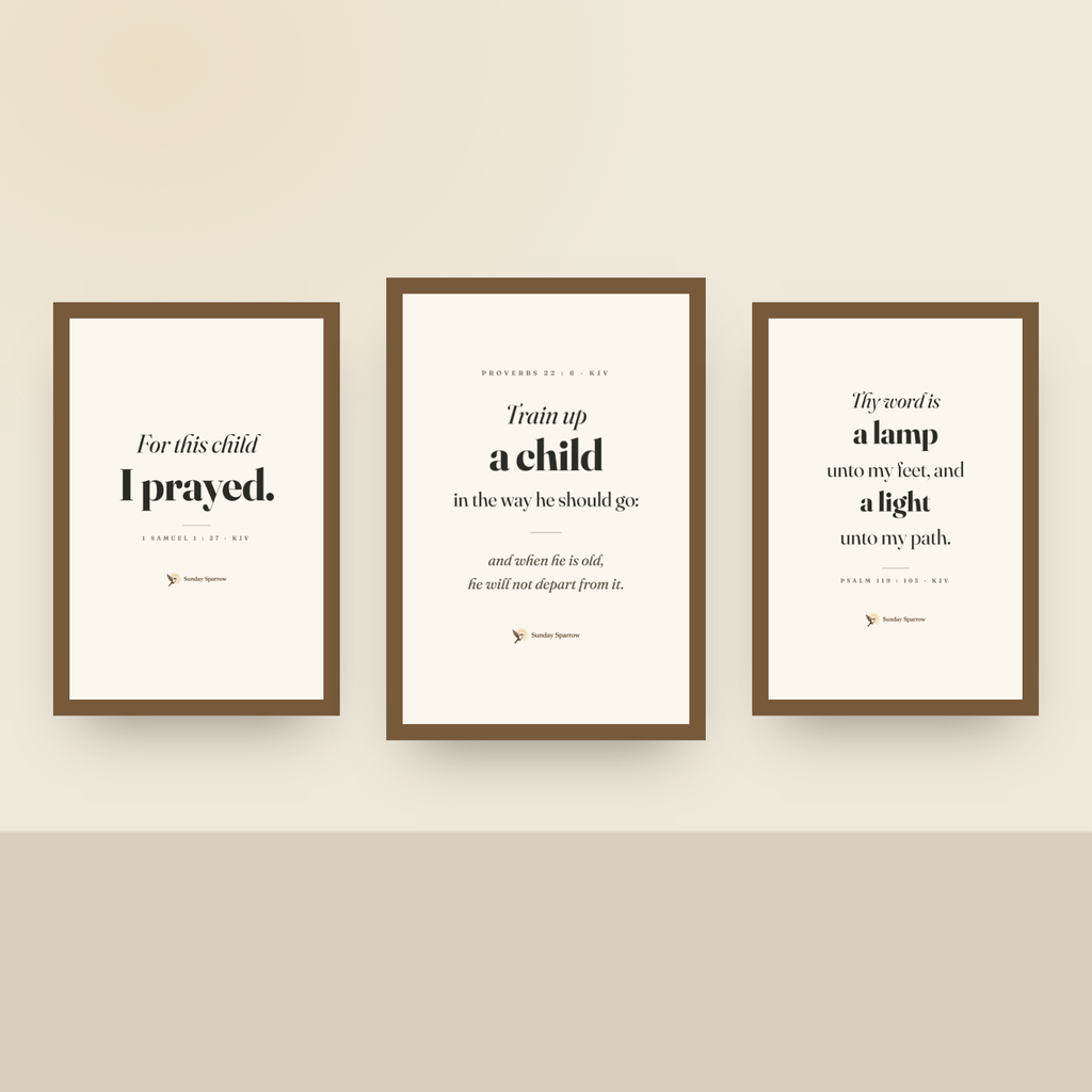 Framed 3-set on a nursery wall — Train Up A Child with For This Child I Prayed and A Lamp Unto My Feet, oak finish wood frames
