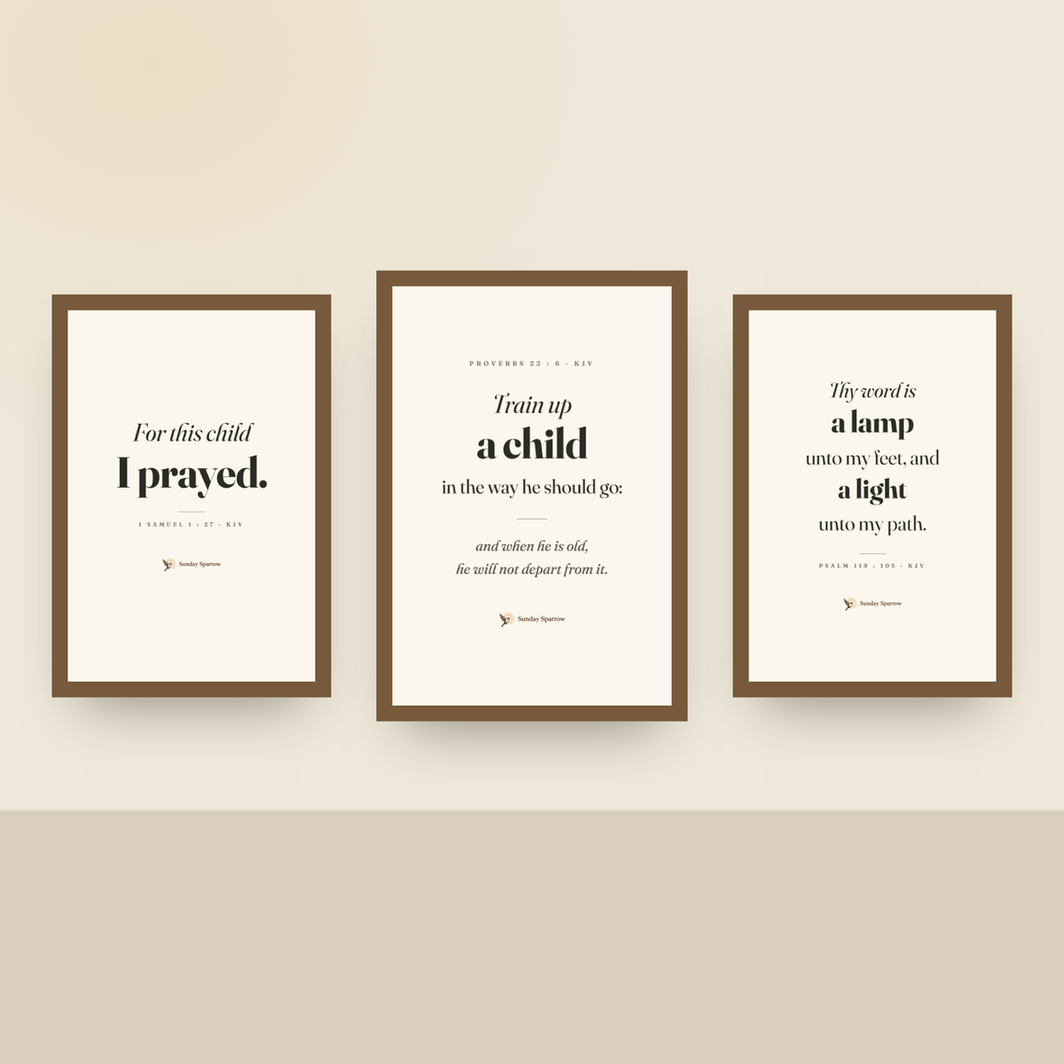 Framed 3-set on a nursery wall — Train Up A Child with For This Child I Prayed and A Lamp Unto My Feet, oak finish wood frames