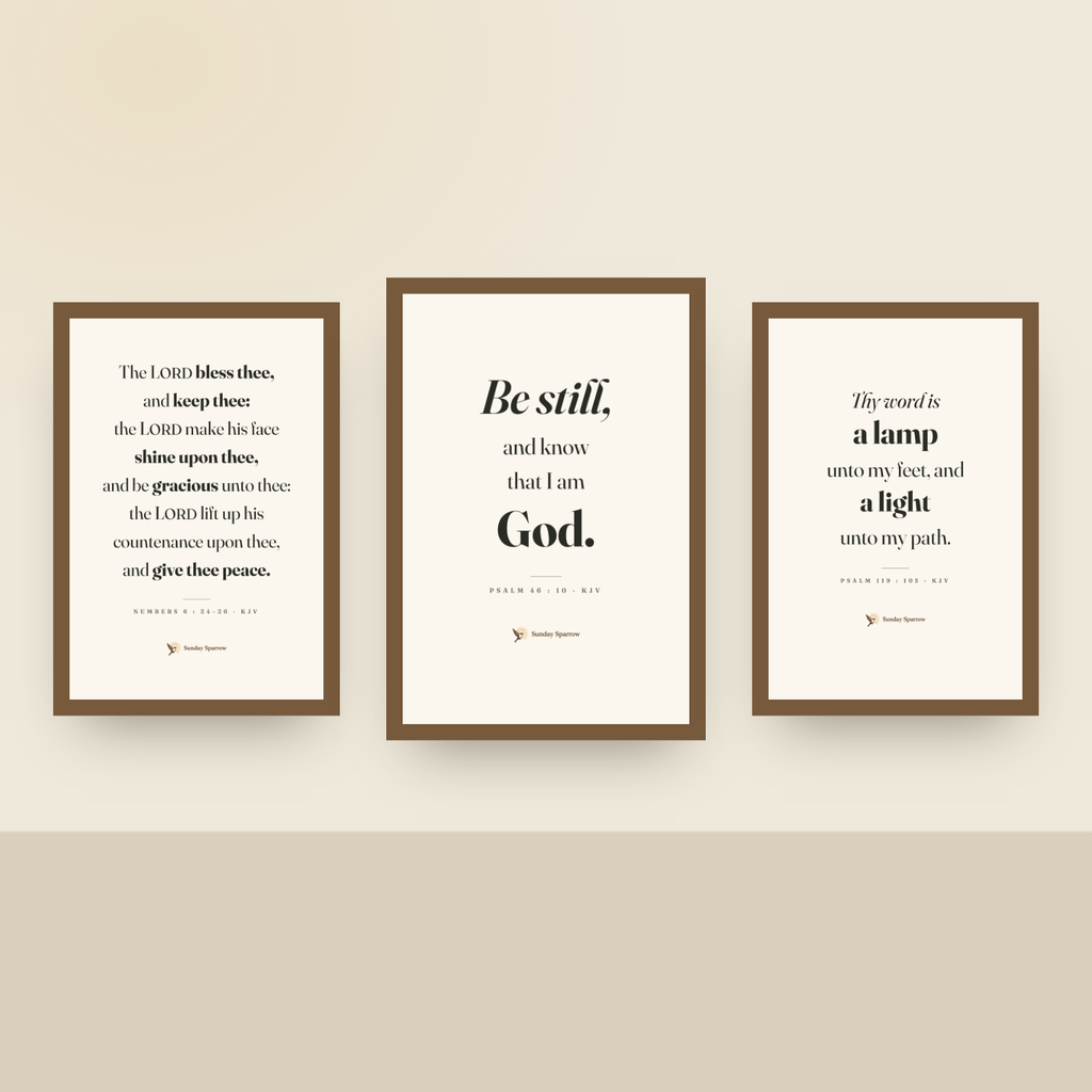 Framed 3-set on a nursery wall — Be Still with The Benediction and A Lamp Unto My Feet, oak finish wood frames